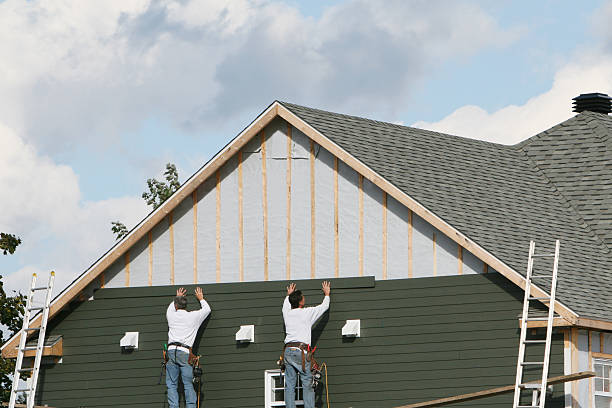 Professional Siding Installation technician working in Peapack, NJ